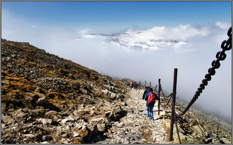 Hikers on Mountain Trail — Blue, Dramatic