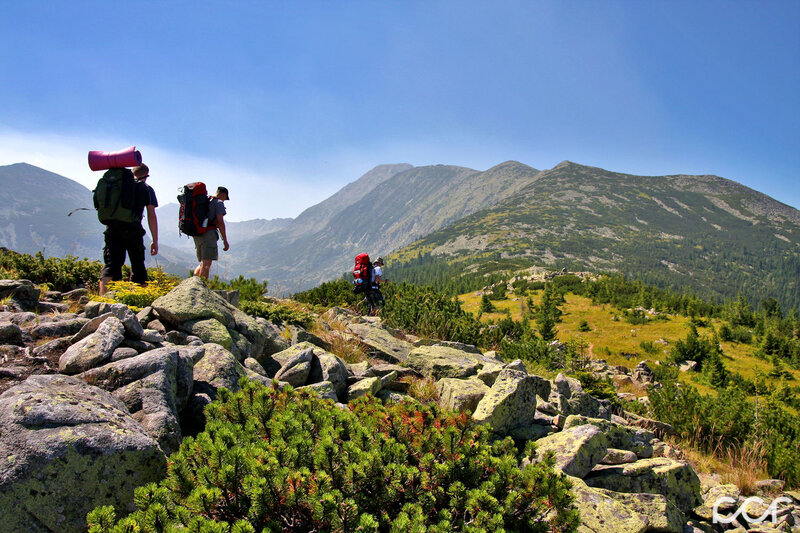 Hikers on Mountain Trail — Blue