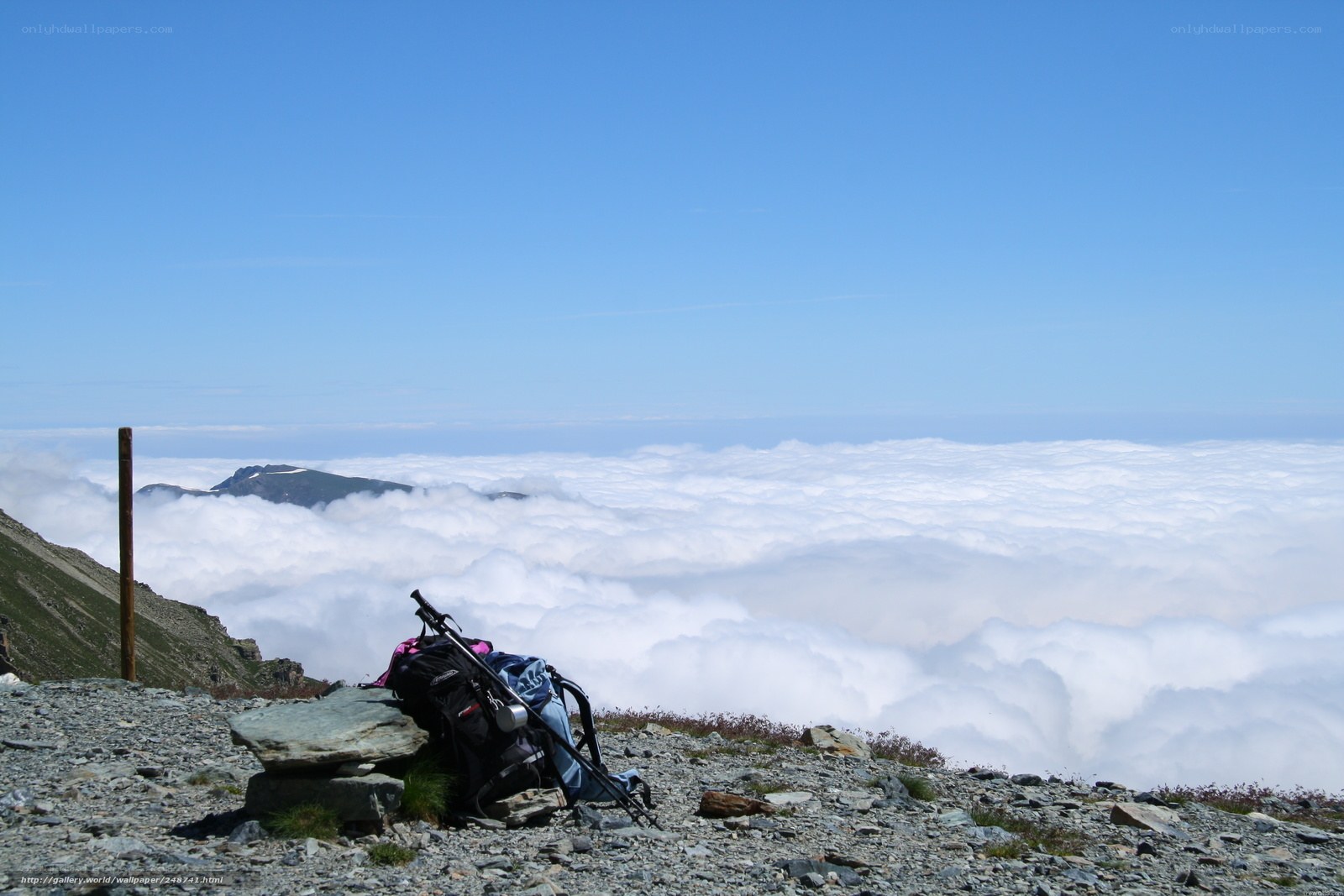 Hiking gear on mountain peak