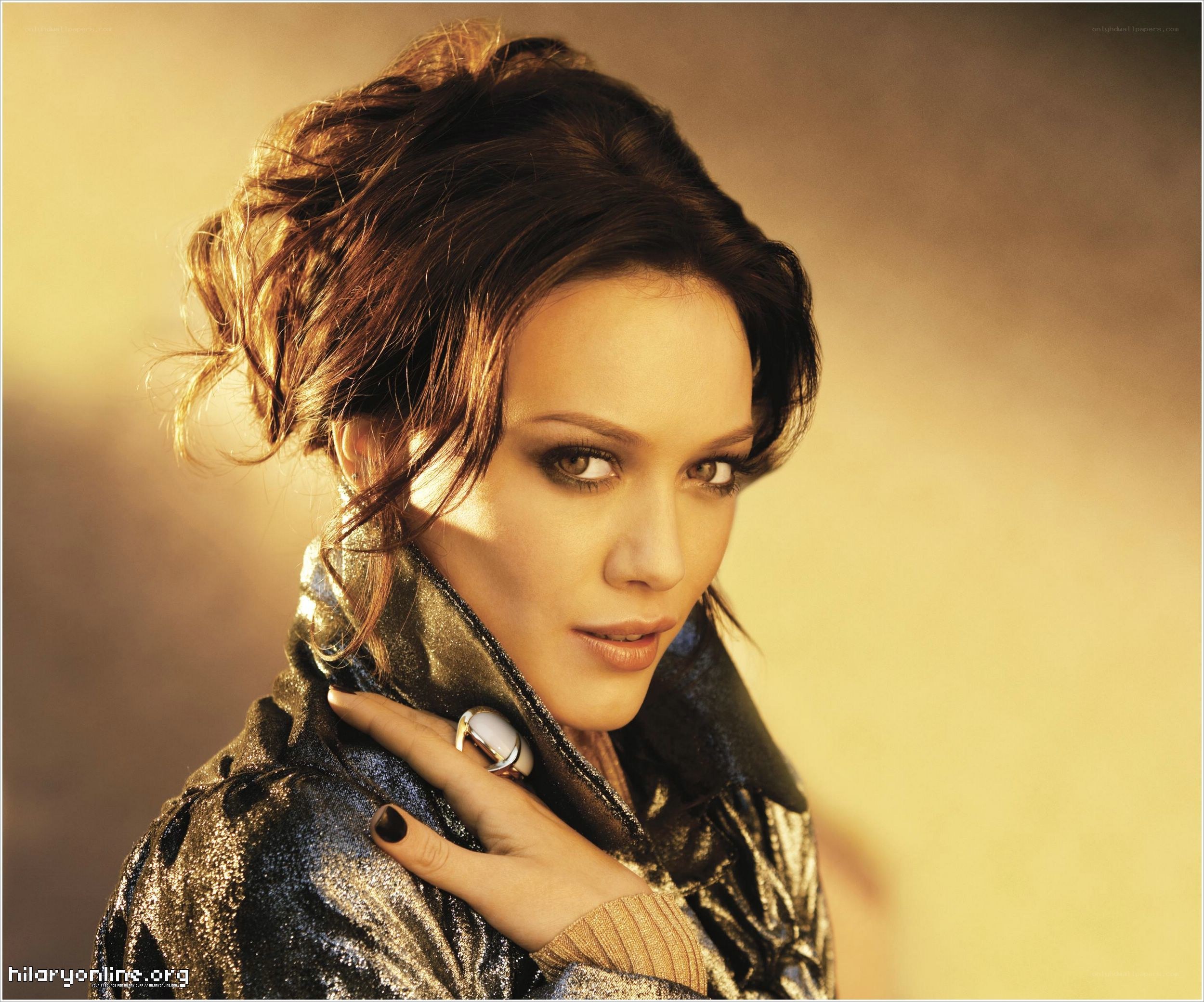 Hilary Swank in a sparkly jacket