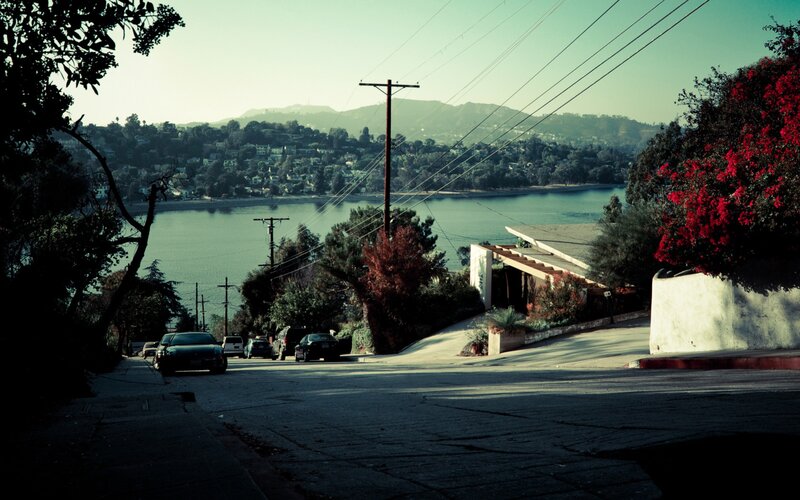 Hillside street with lake view