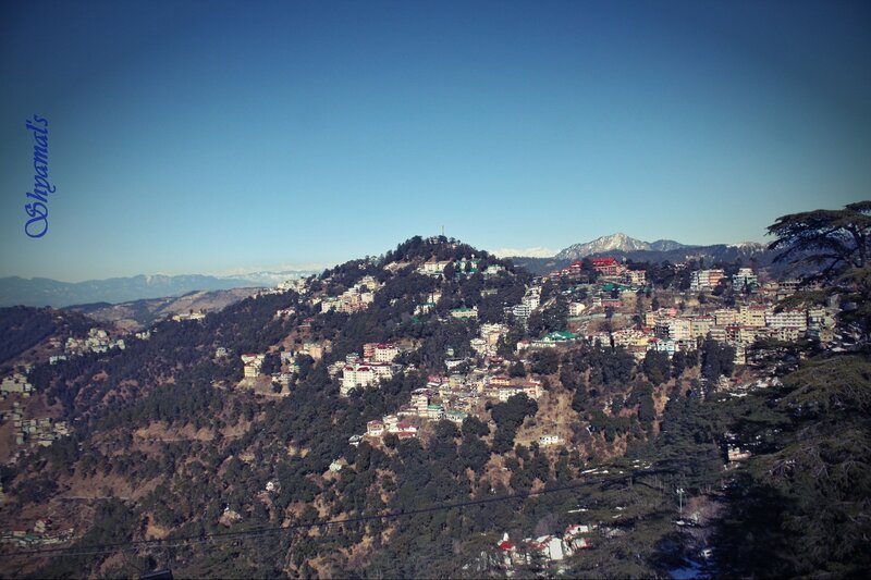 Hillside Town with Mountains