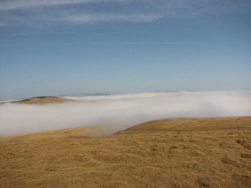 Hilltop Above Clouds