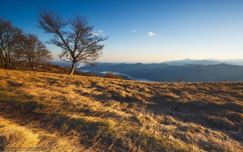 Hilltop view of lake and mountains