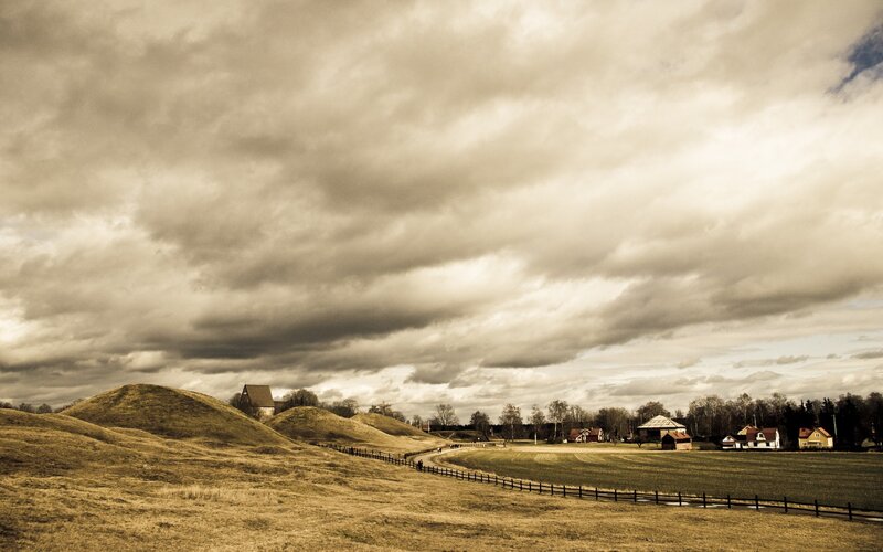 Hilltops under a cloudy sky