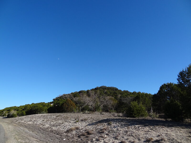 Hilly Landscape under Blue Sky