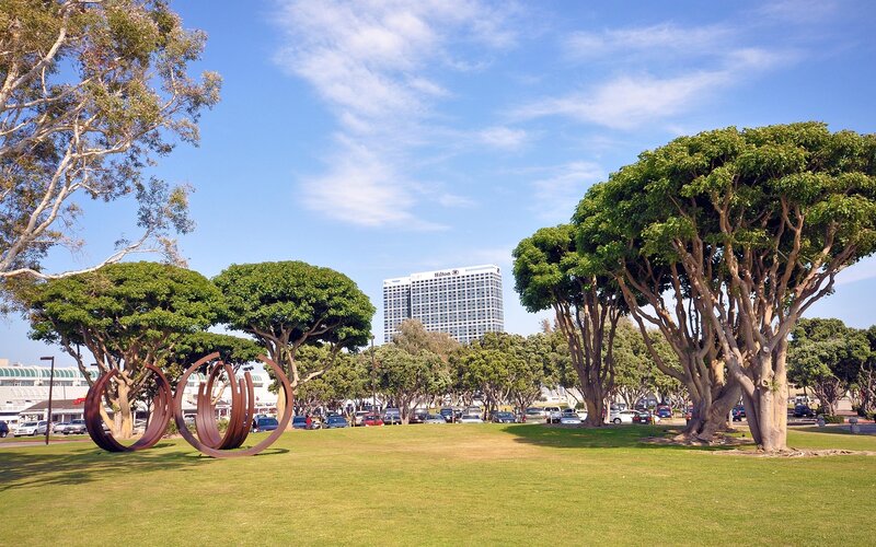 Hilton hotel with park and sculpture