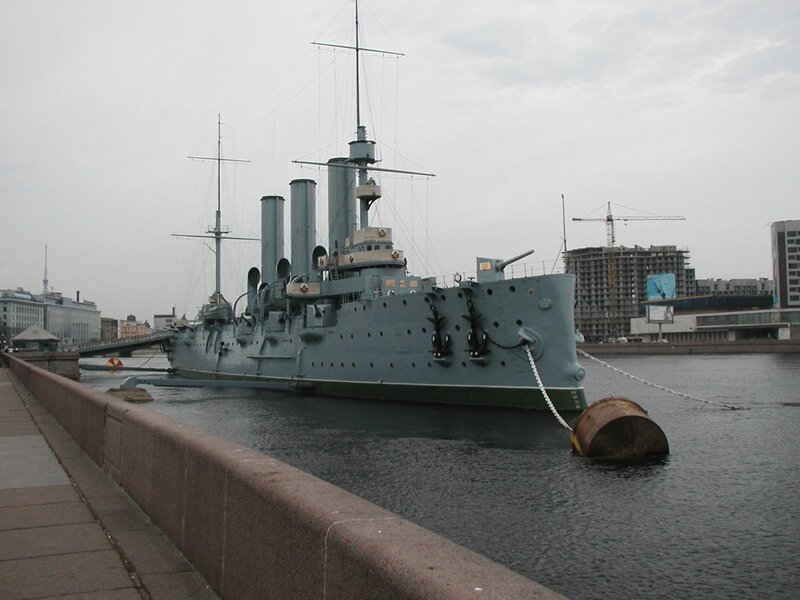 historic battleship in city harbor