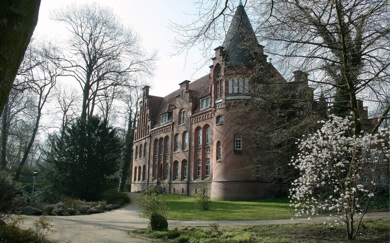 Historic brick building in a park