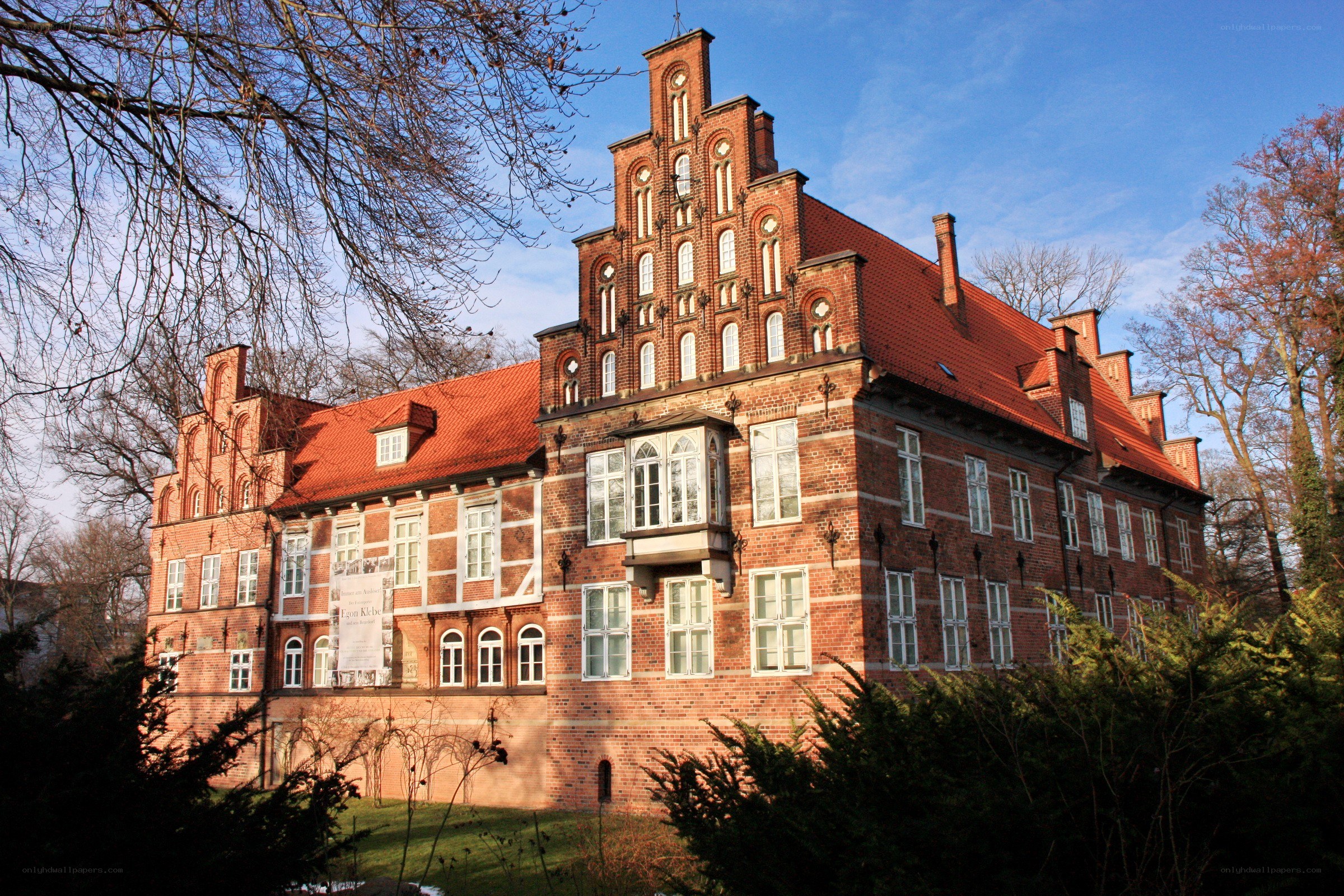 historic brick building with gabled roof
