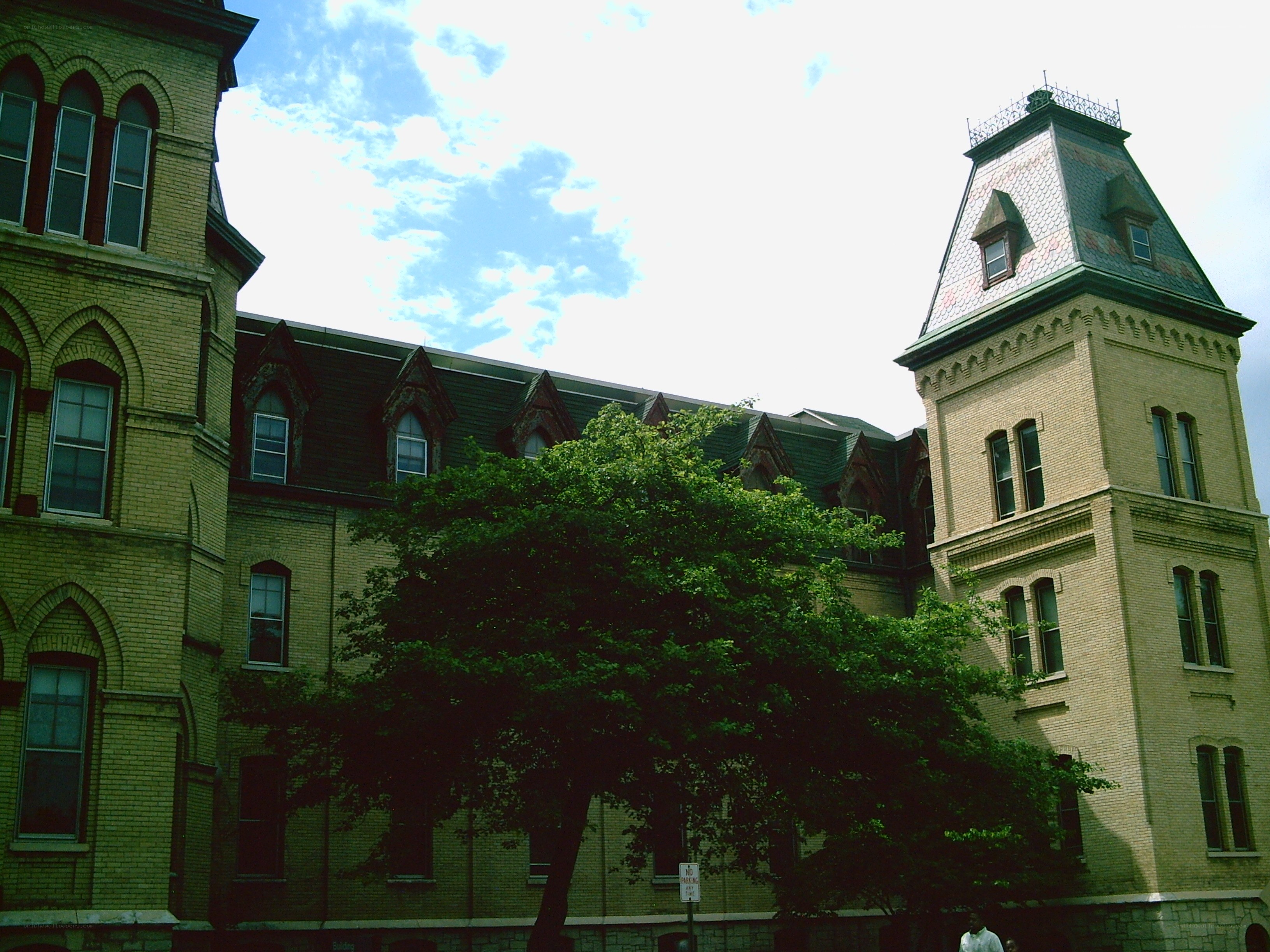 historic brick building with tower