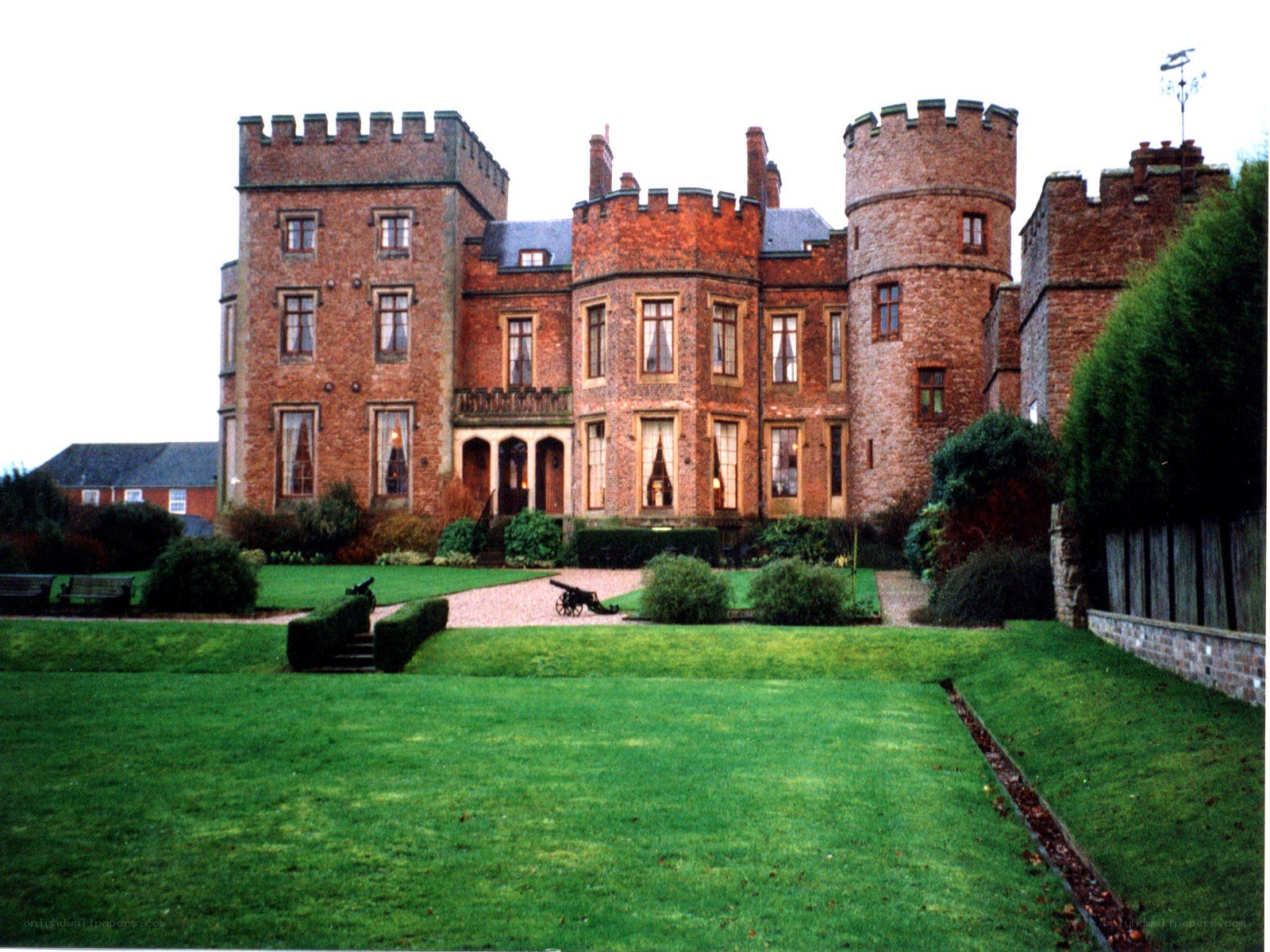 historic brick castle with gardens