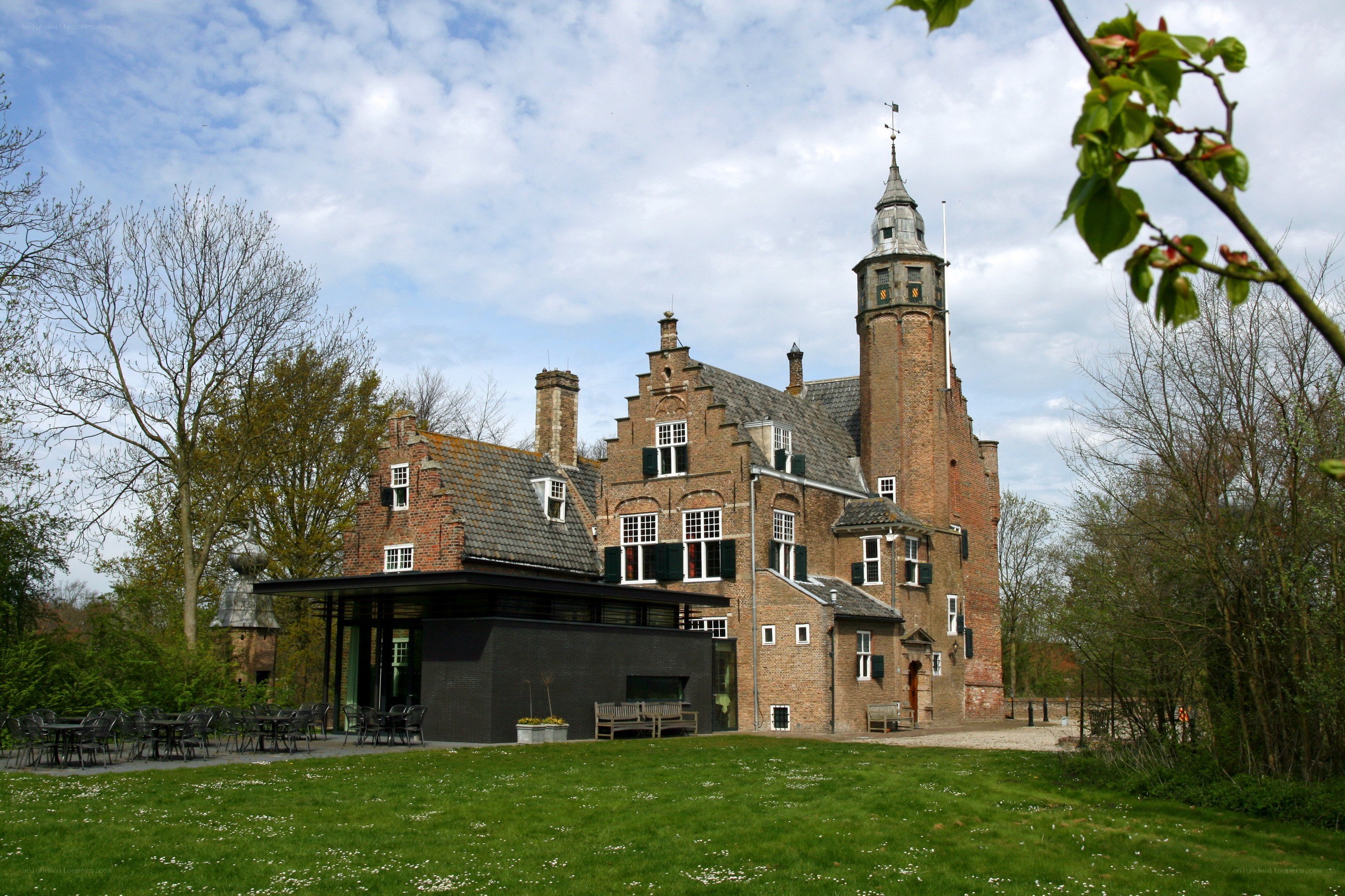 historic brick castle with modern extension