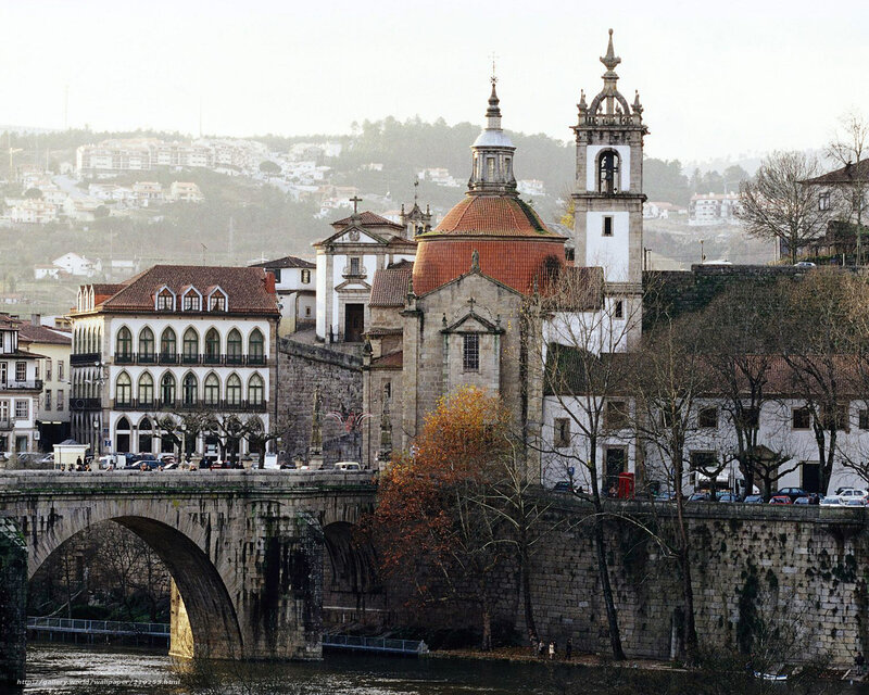 historic bridge and church in portugal