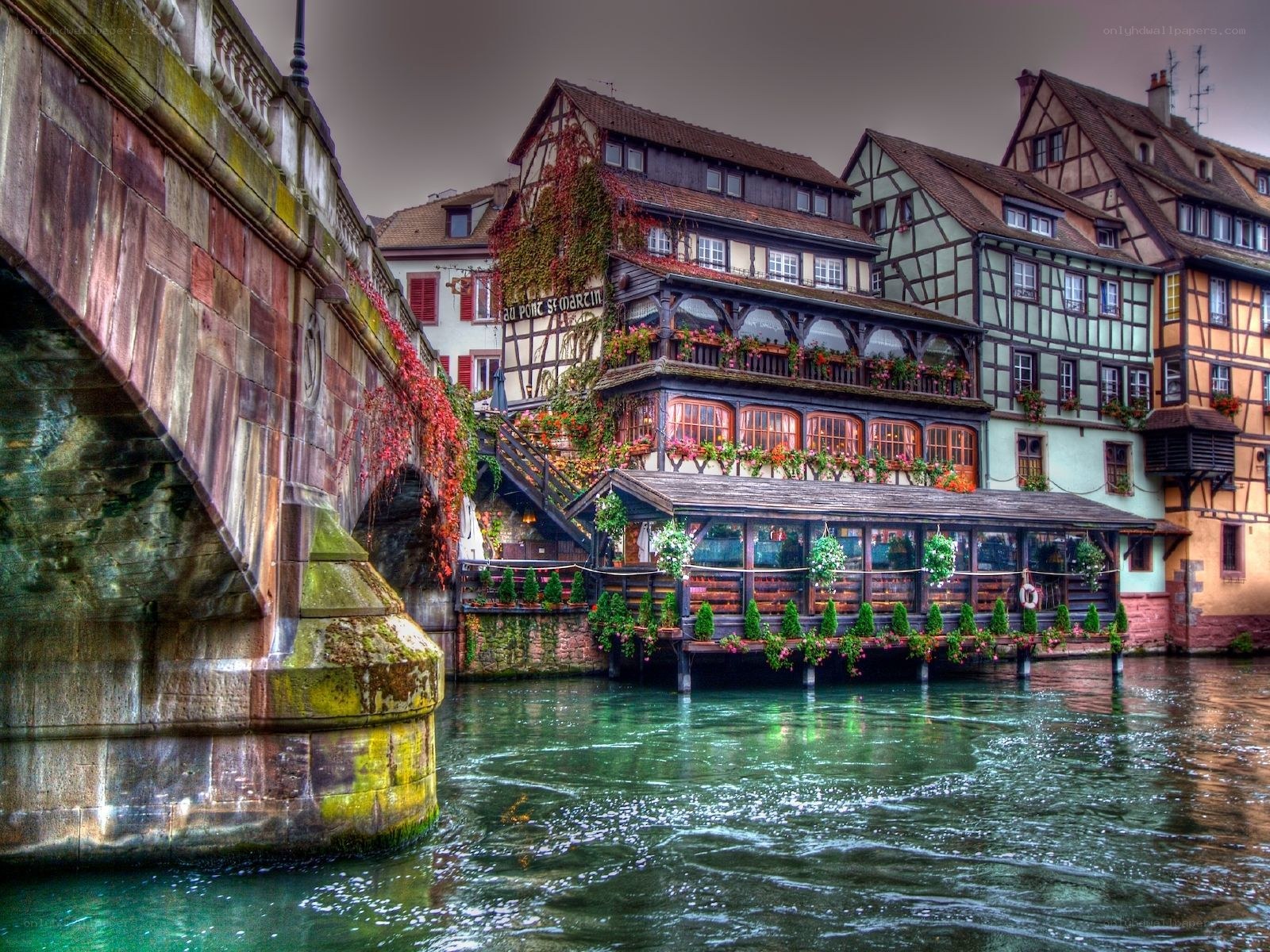historic bridge and half-timbered buildings