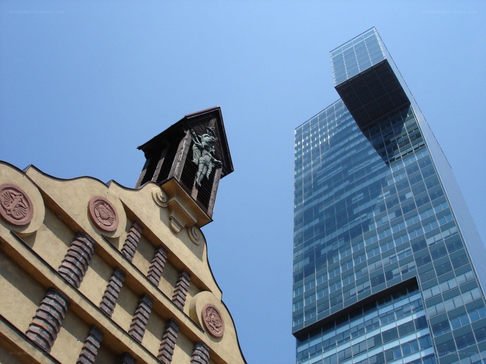 Historic building and modern skyscraper