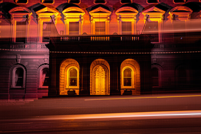 Historic Building at Night — Orange, Dramatic