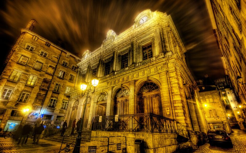 Historic Building at Night — Yellow