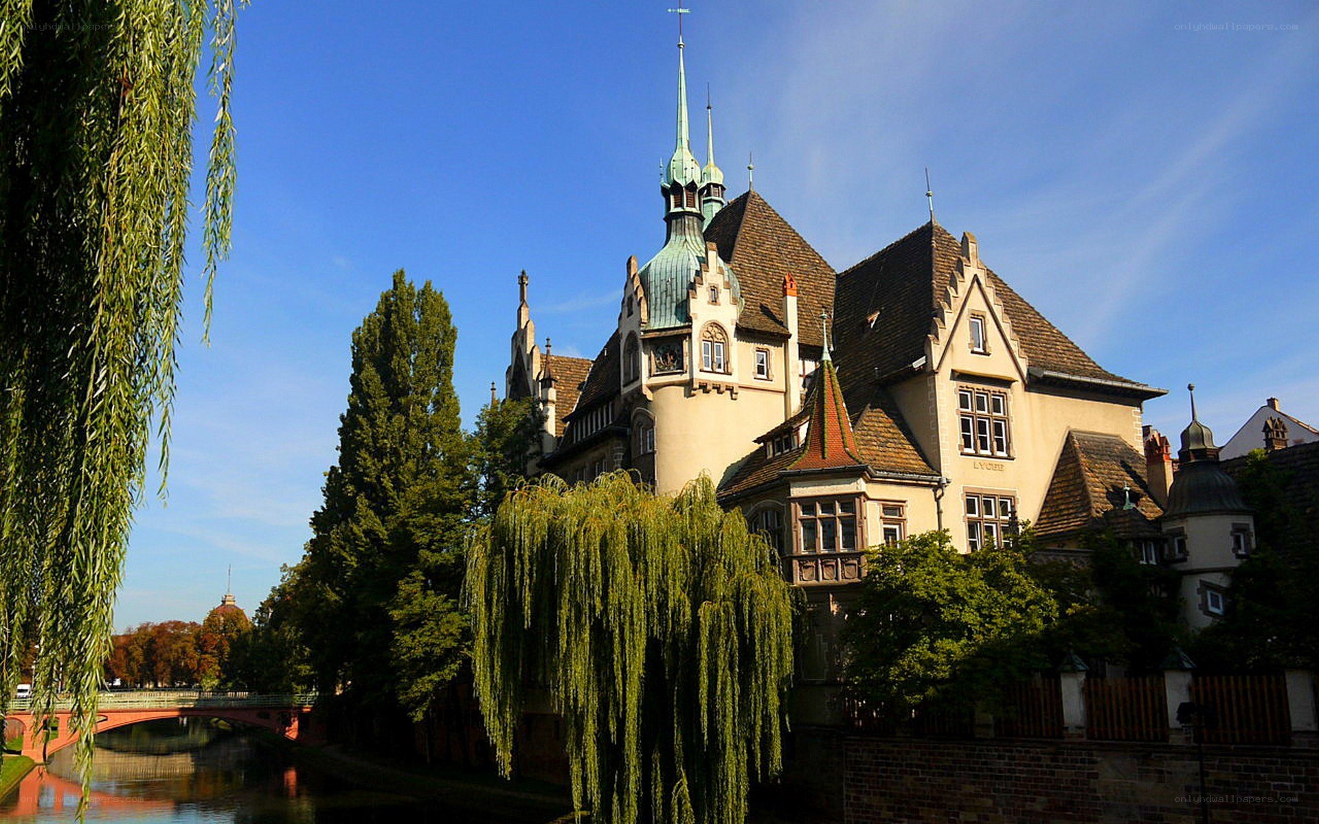 Historic building by a river