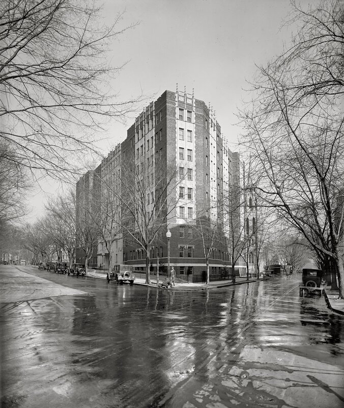 Historic building on a wet street
