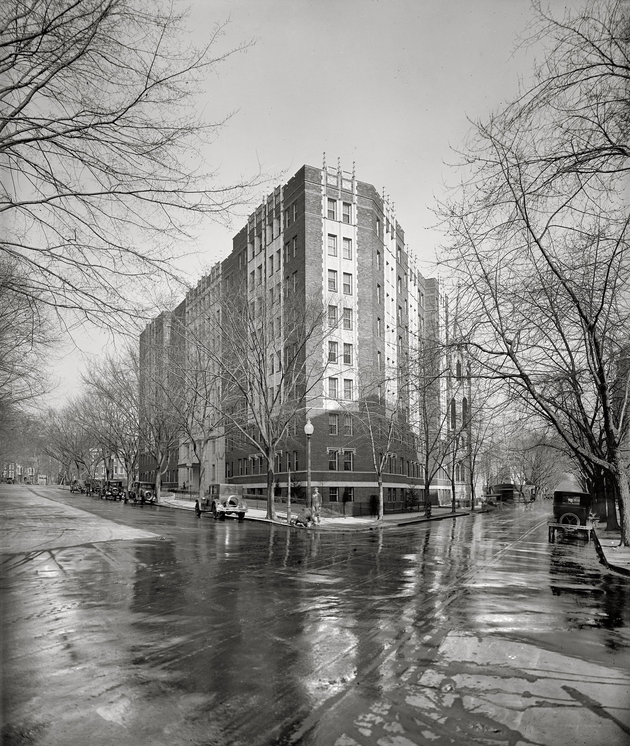 Historic building on a wet street