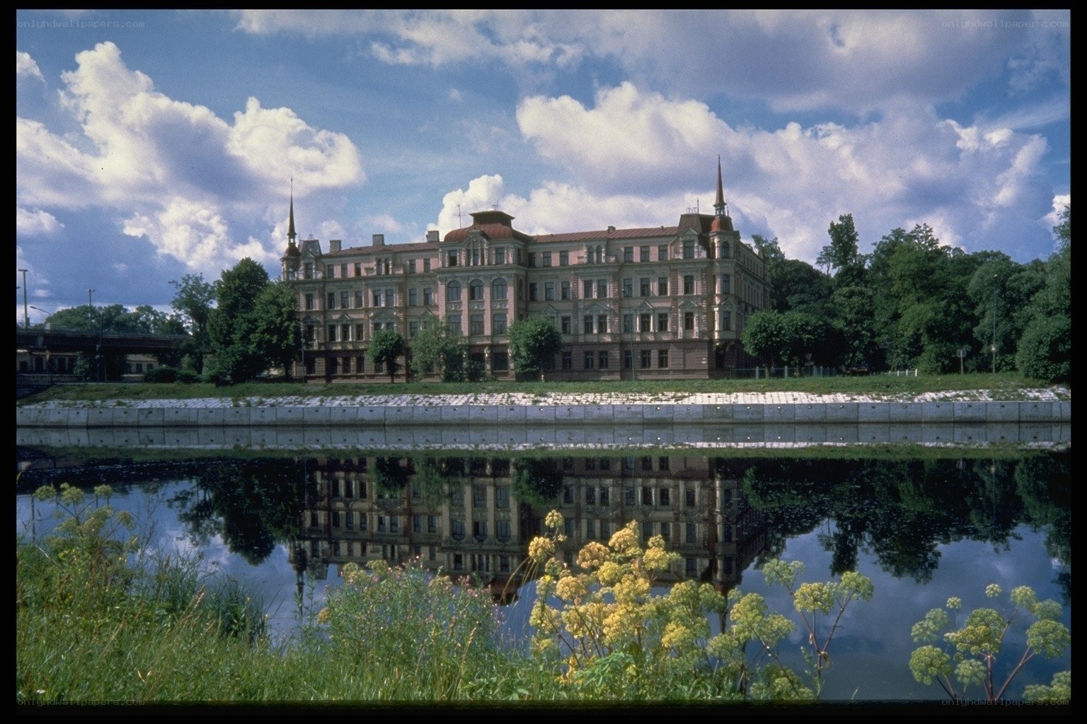 Historic building reflected in water