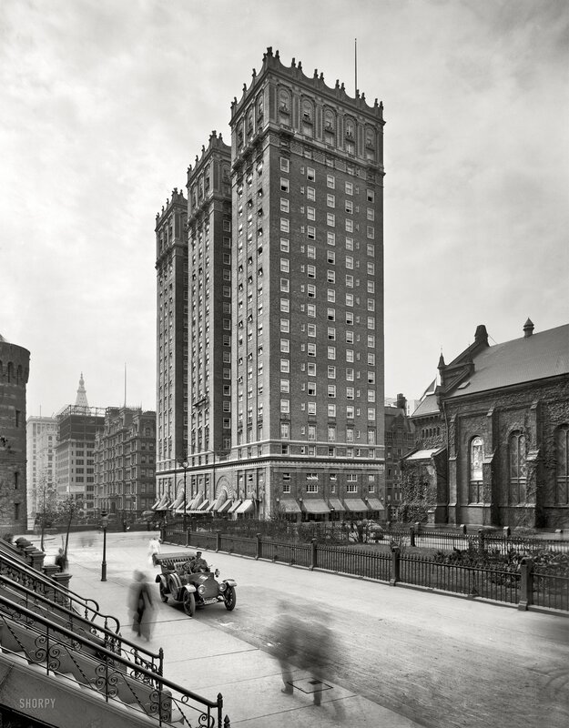 Historic building with vintage car