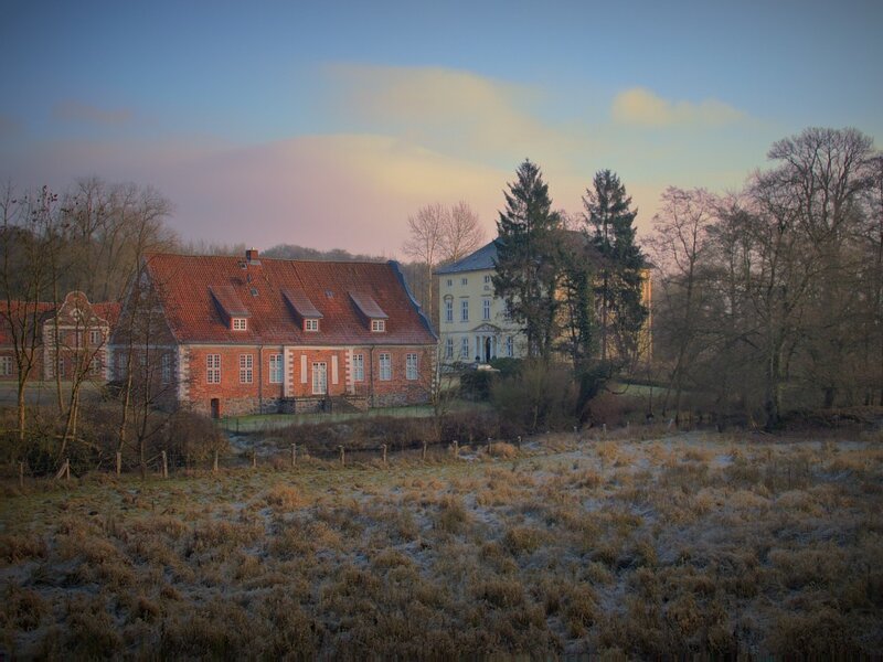 Historic buildings in a frosty landscape