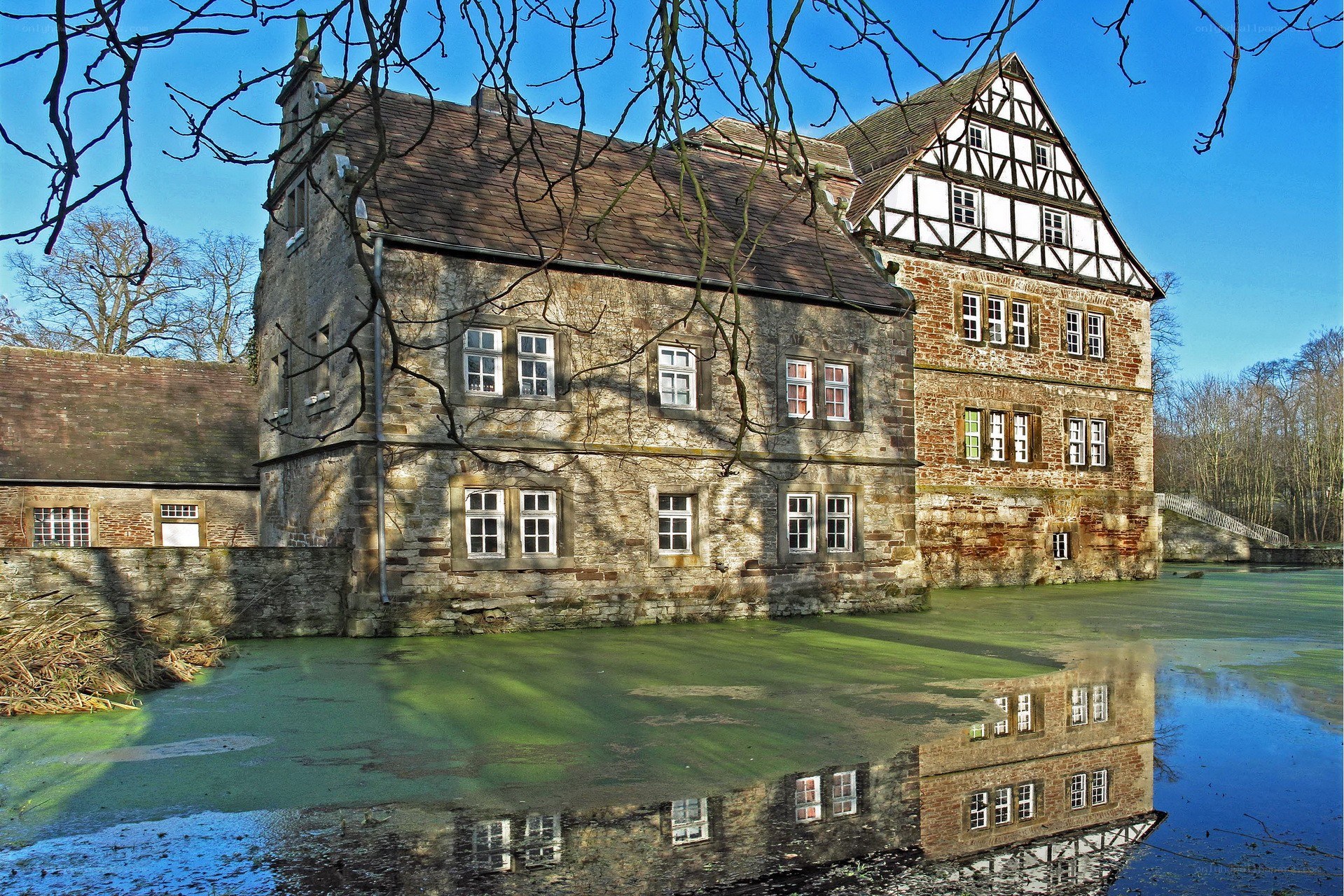 Historic castle reflected in water