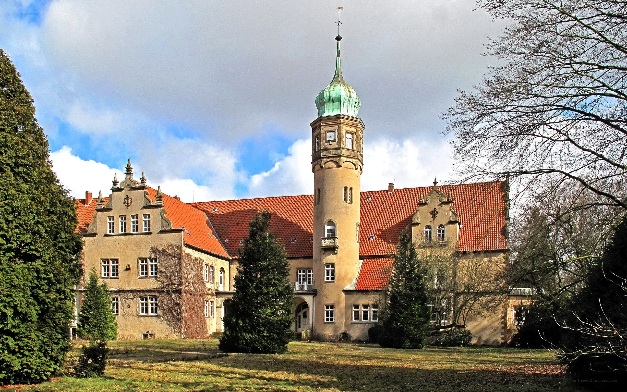 Historic castle with green spire
