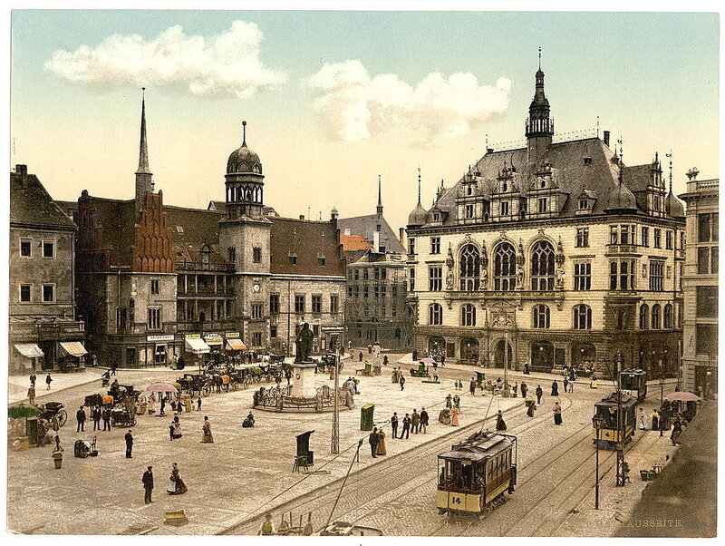 Historic city square with tram