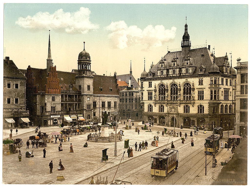Historic city square with tram