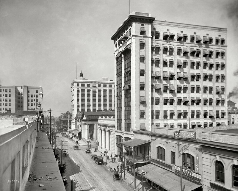 Historic city street with early skyscrapers