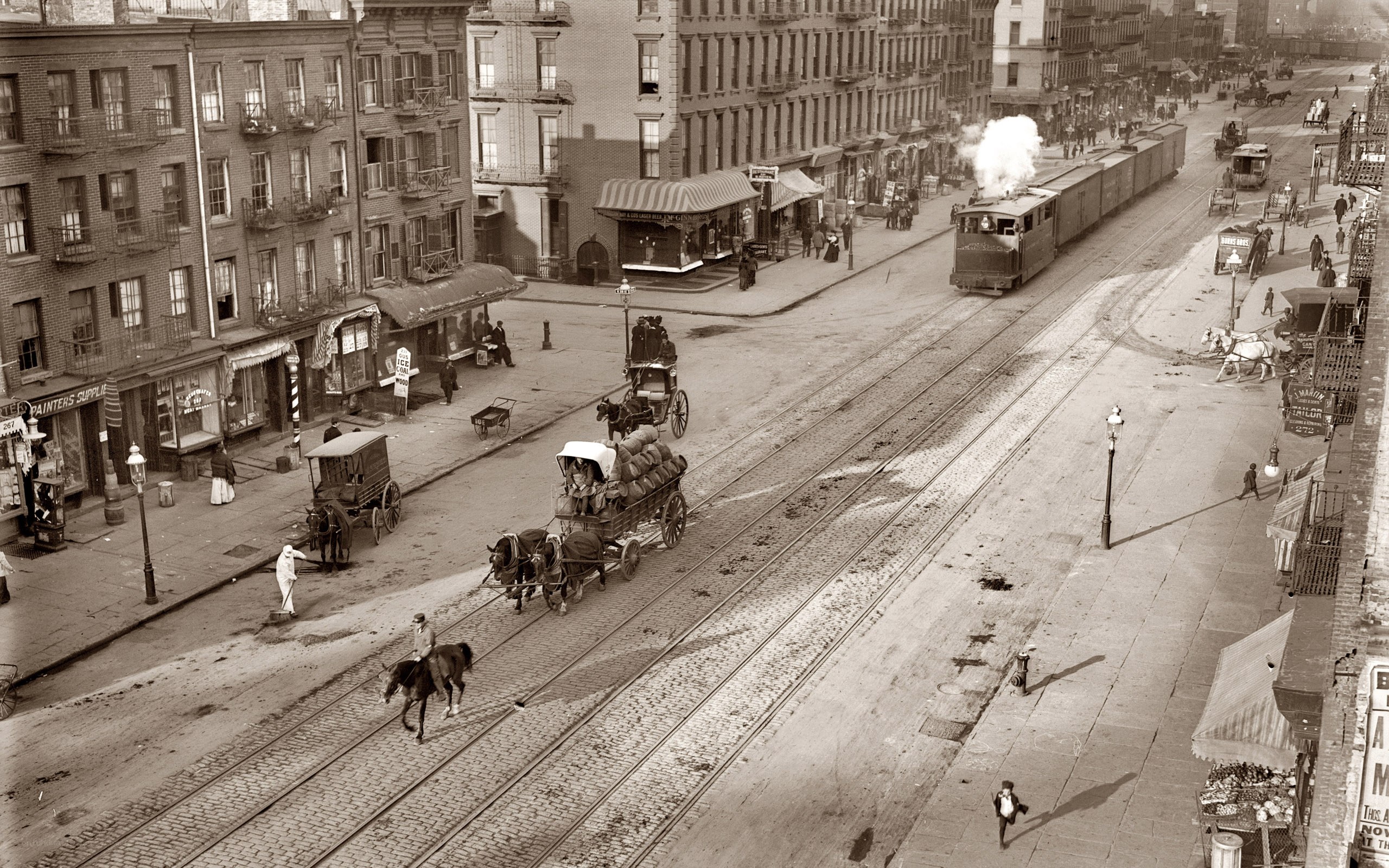 Historic city street with steam train