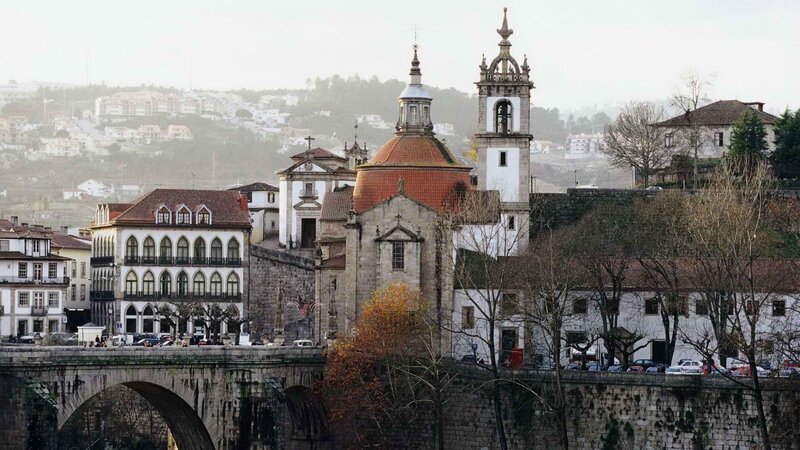 historic city with church and bridge