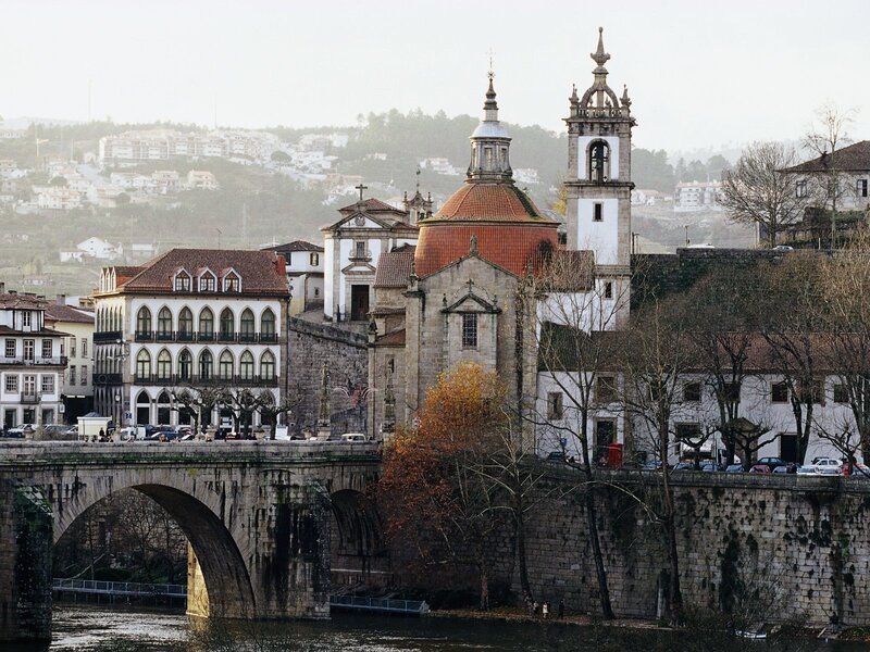 Historic cityscape with bridge and church