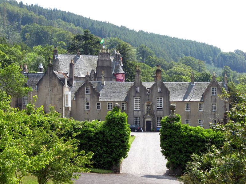historic estate with forest backdrop