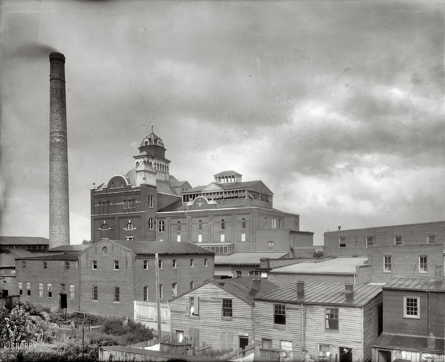 Historic factory complex with smokestack