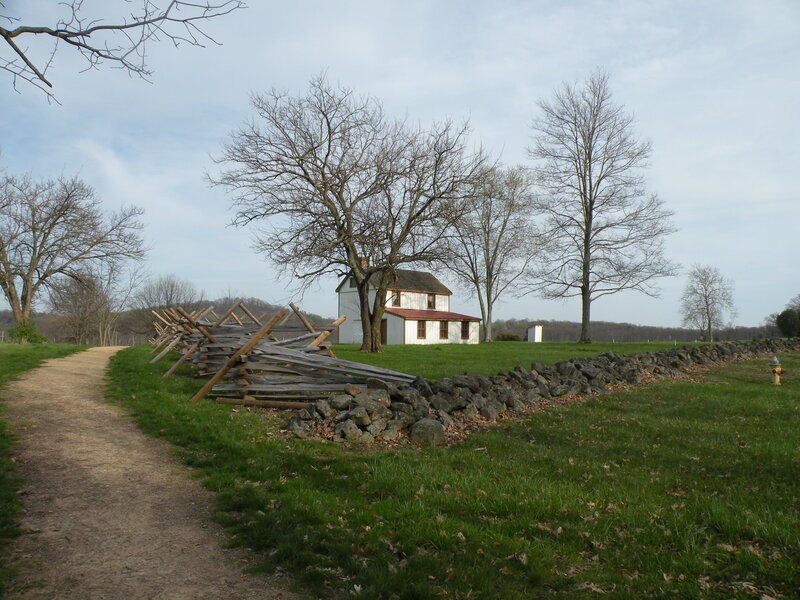 Historic farmhouse with split-rail fence