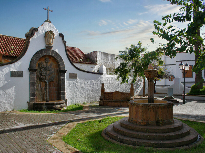 Historic fountain in a Spanish courtyard