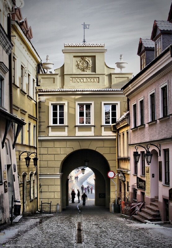 Historic gate in a cobblestone street