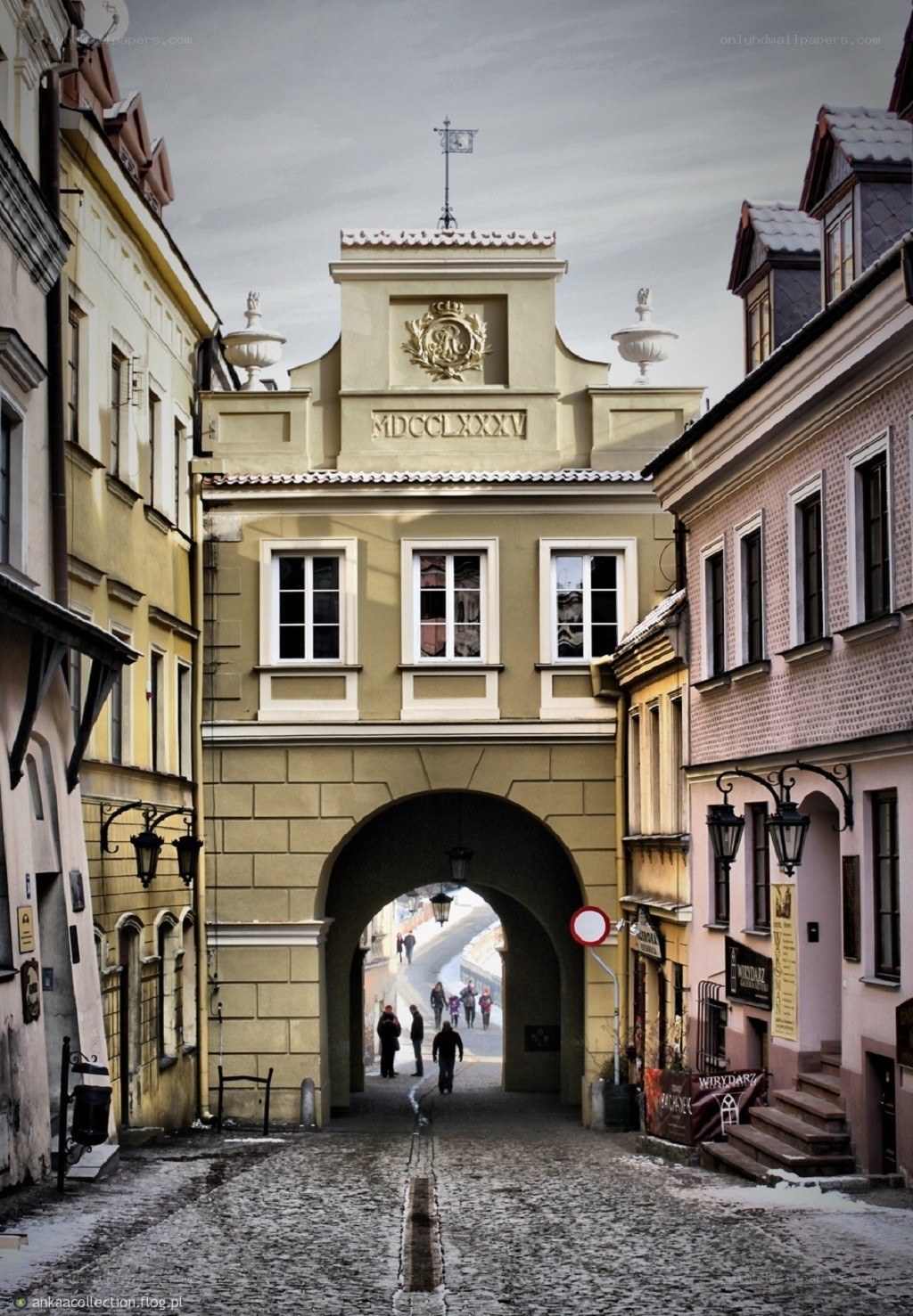 Historic gate in a cobblestone street