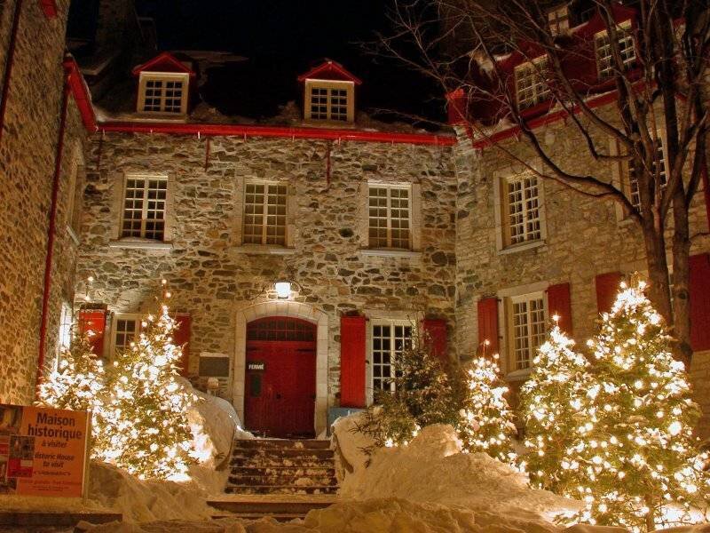 Historic house at night with Christmas lights
