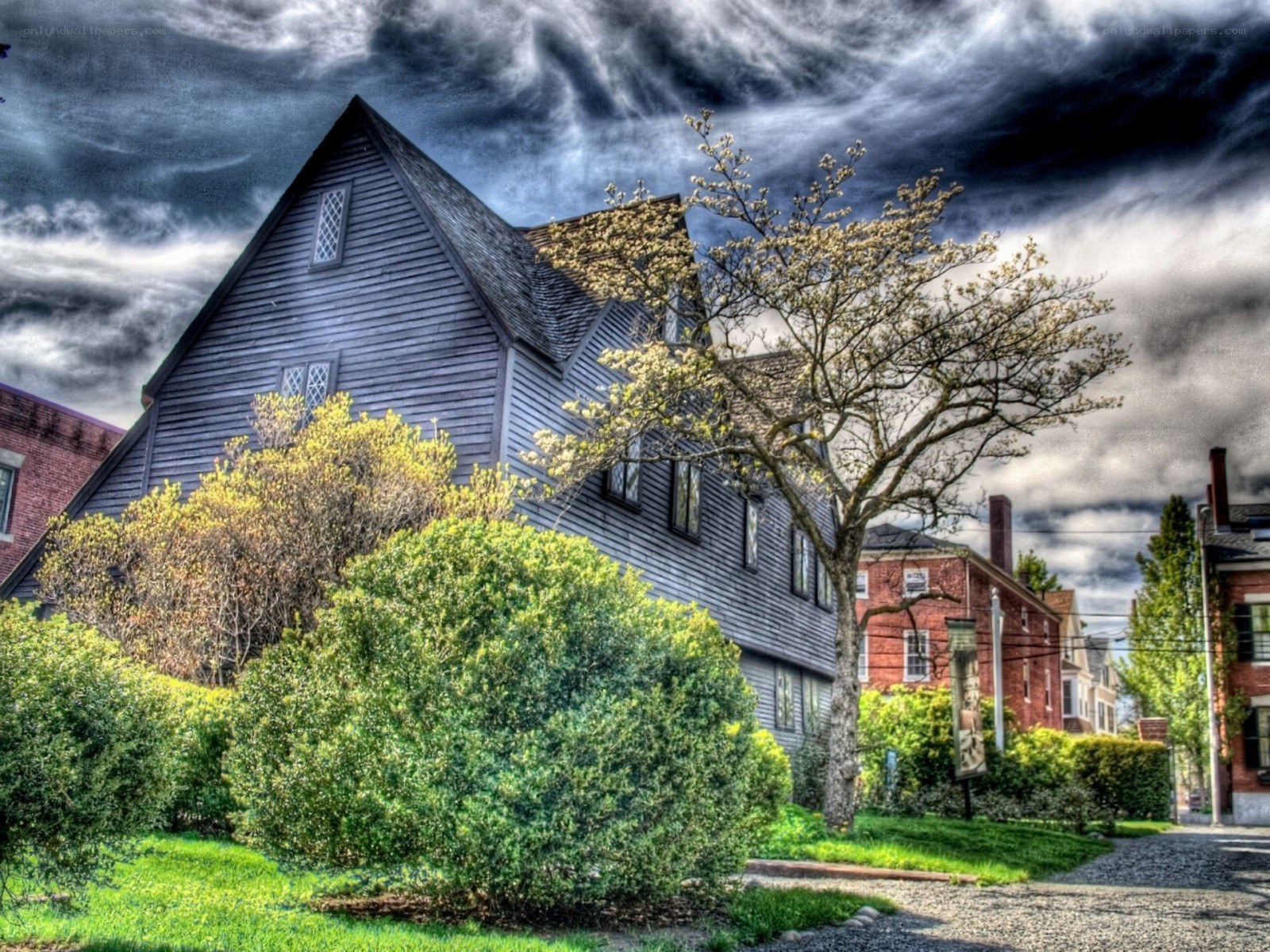 Historic house under stormy sky