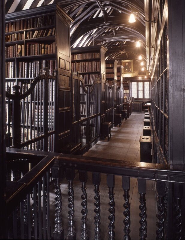 Historic library with wooden bookshelves
