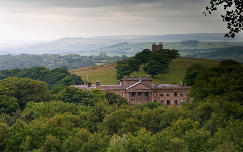 historic mansion in rural landscape