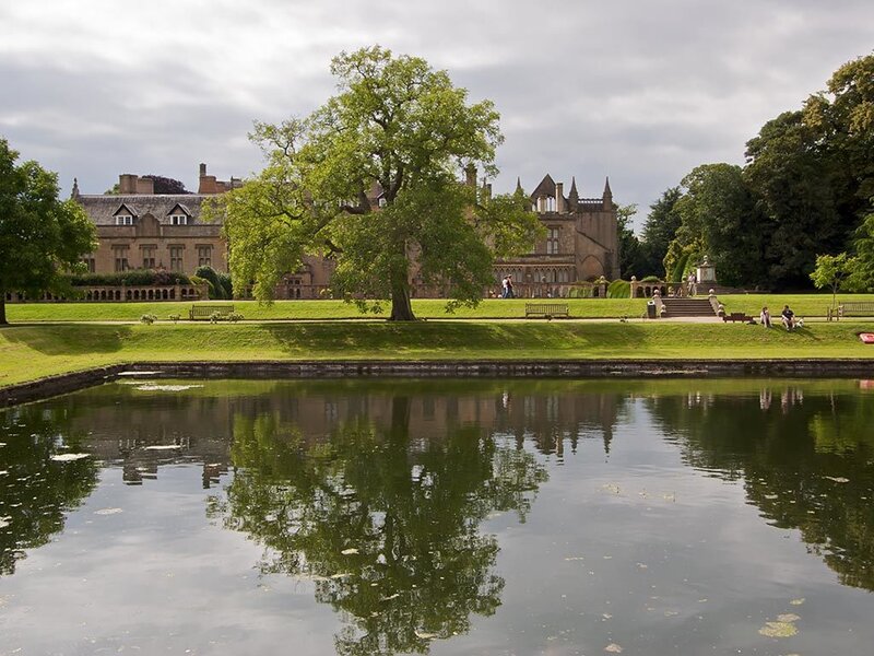 Historic mansion with pond and gardens