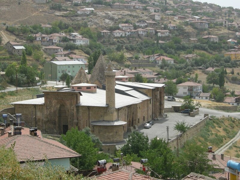 historic mosque in a hillside town