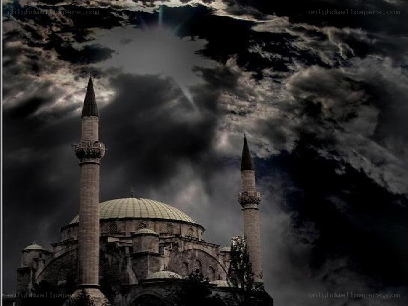 Historic mosque under stormy sky