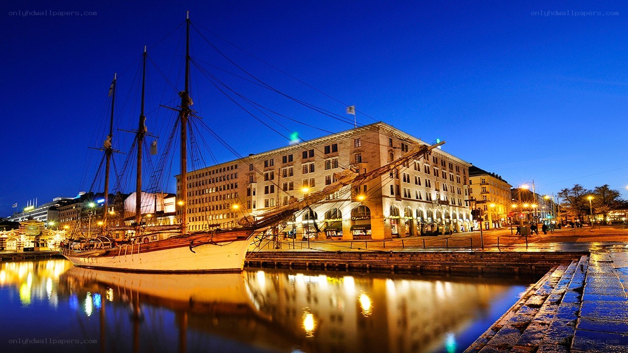 historic ship at harbor in evening
